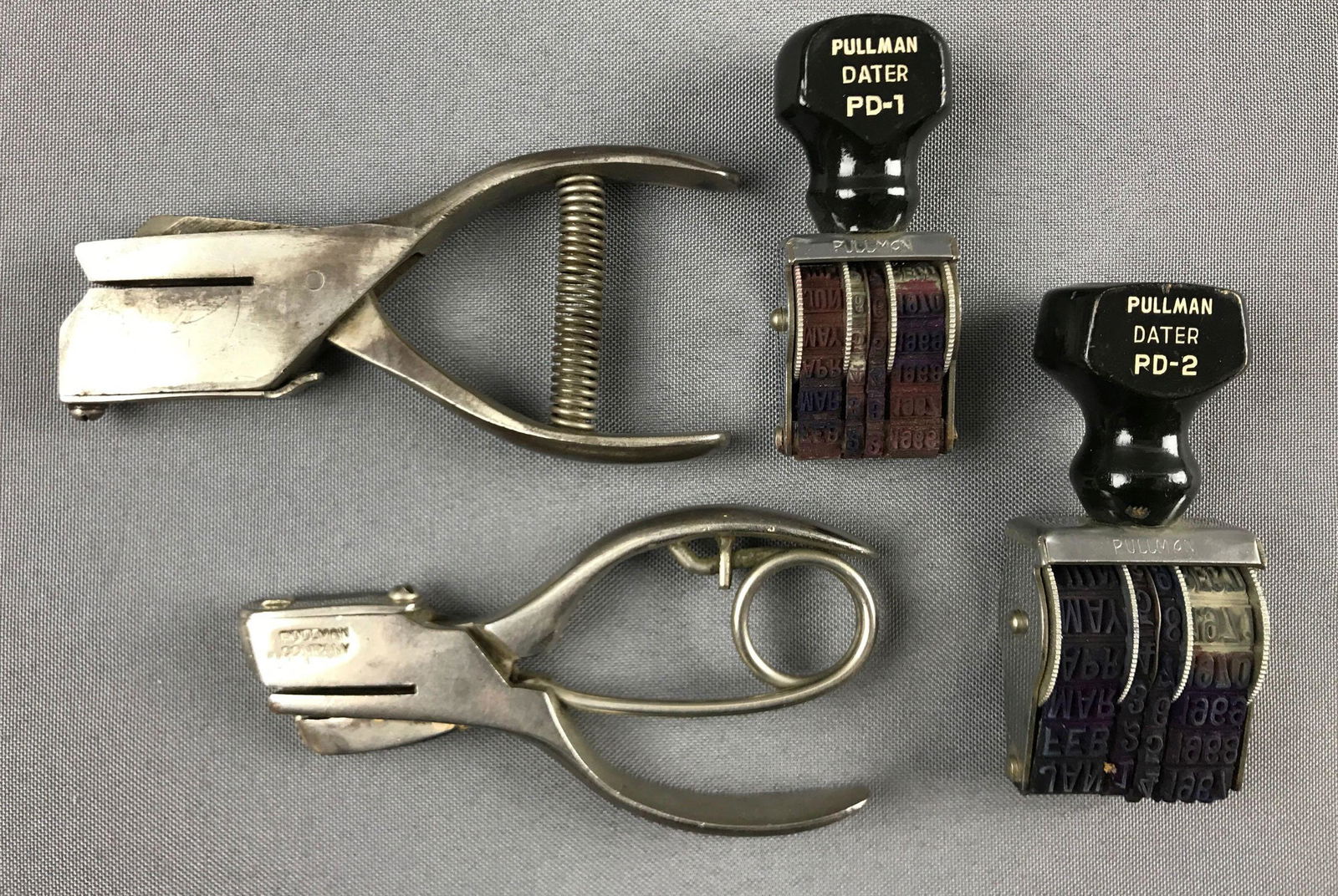 Group of 4 vintage Pullman railroad ticket punch and: Both ticket punch have circle shape.