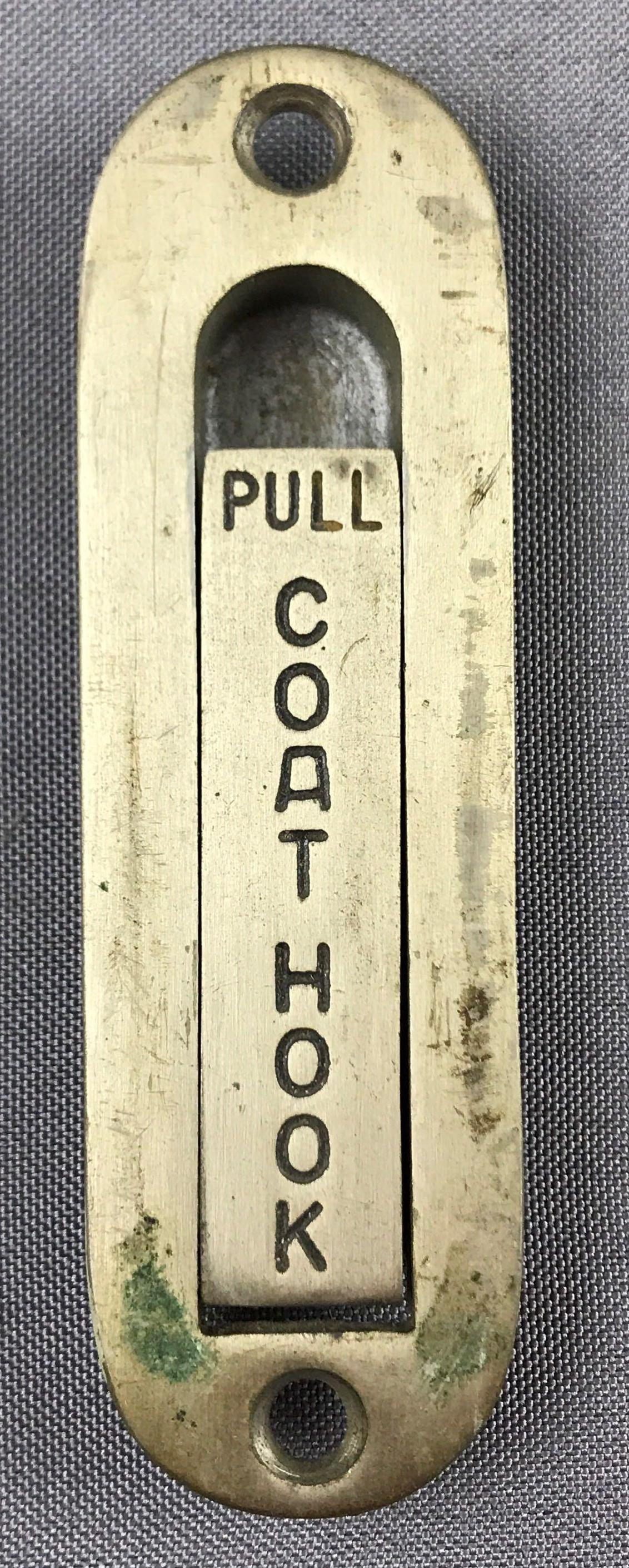 Vintage Pullman Metal pull down coat hook from train: 4.25 inches long. Spring works. Some wear