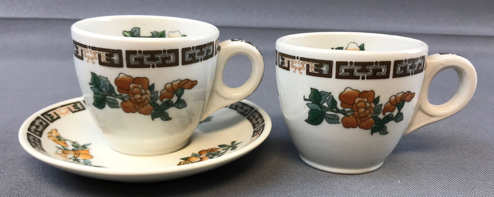 Group of 3 vintage Indian Tree pattern China pieces: Demitasse cups and saucer. Buffalo China, Syracuse China. One cup is cracked. Saucer- 4.5 inch diameter. This is a pattern that Pullman railroad used but these pieces are unmarked.