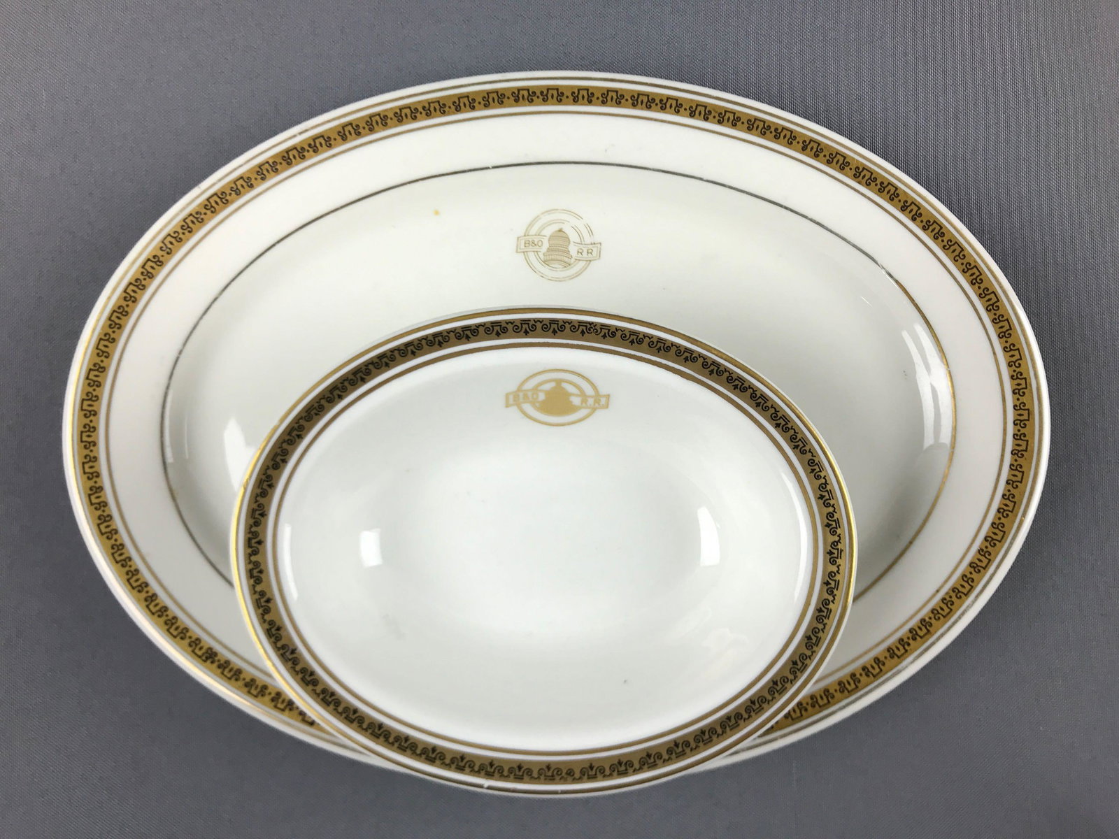 Vintage B&O railroad dishes: Some wear. One repaired spot on back of larger piece. Larger oval platter is 11x8 inches