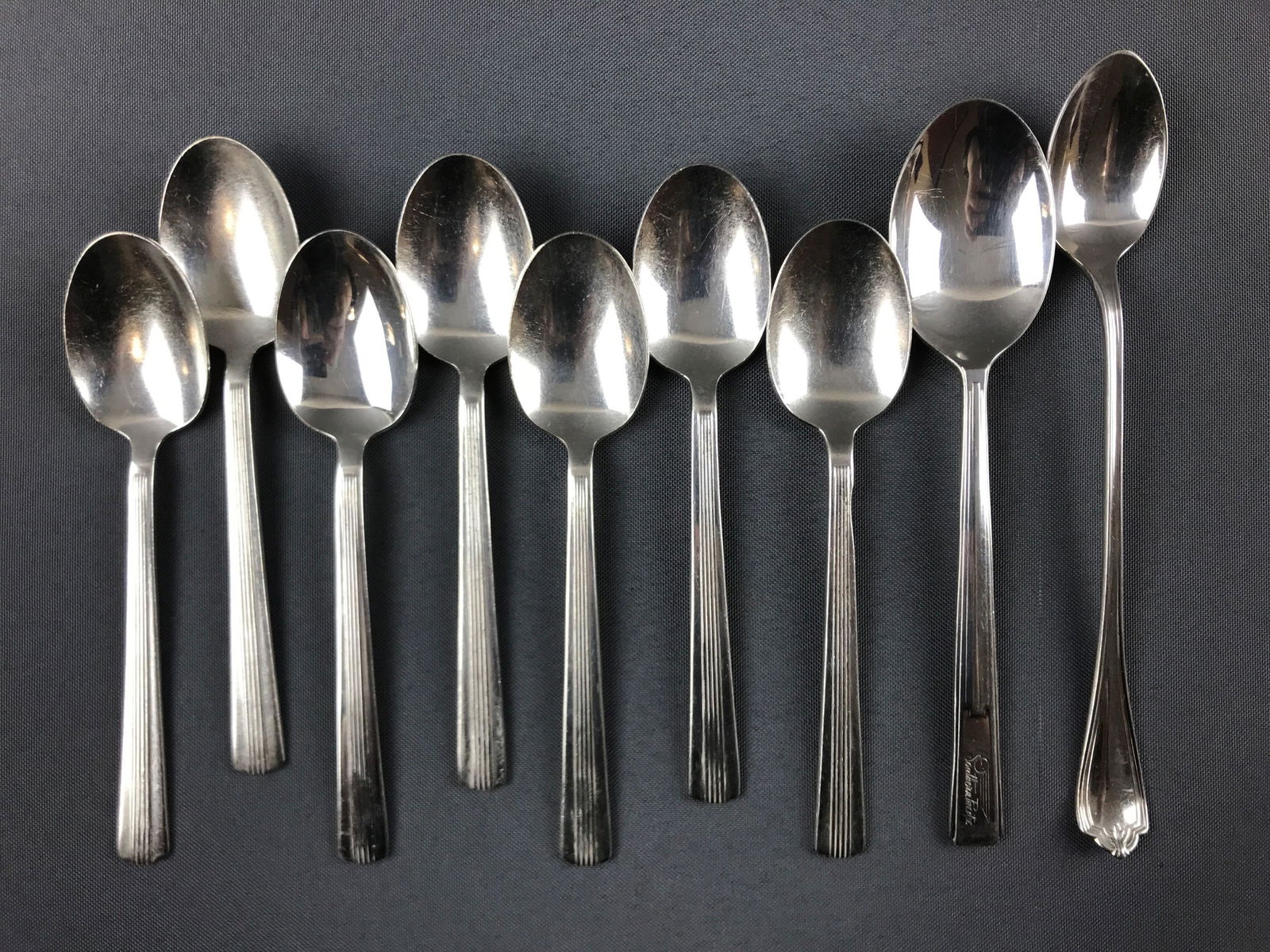 Group of 9 vintage Southern/Southern Pacific spoons: 3 different styles and patterns. Longest is 7.5 inches. International silver co, one piece is Reed and Barton