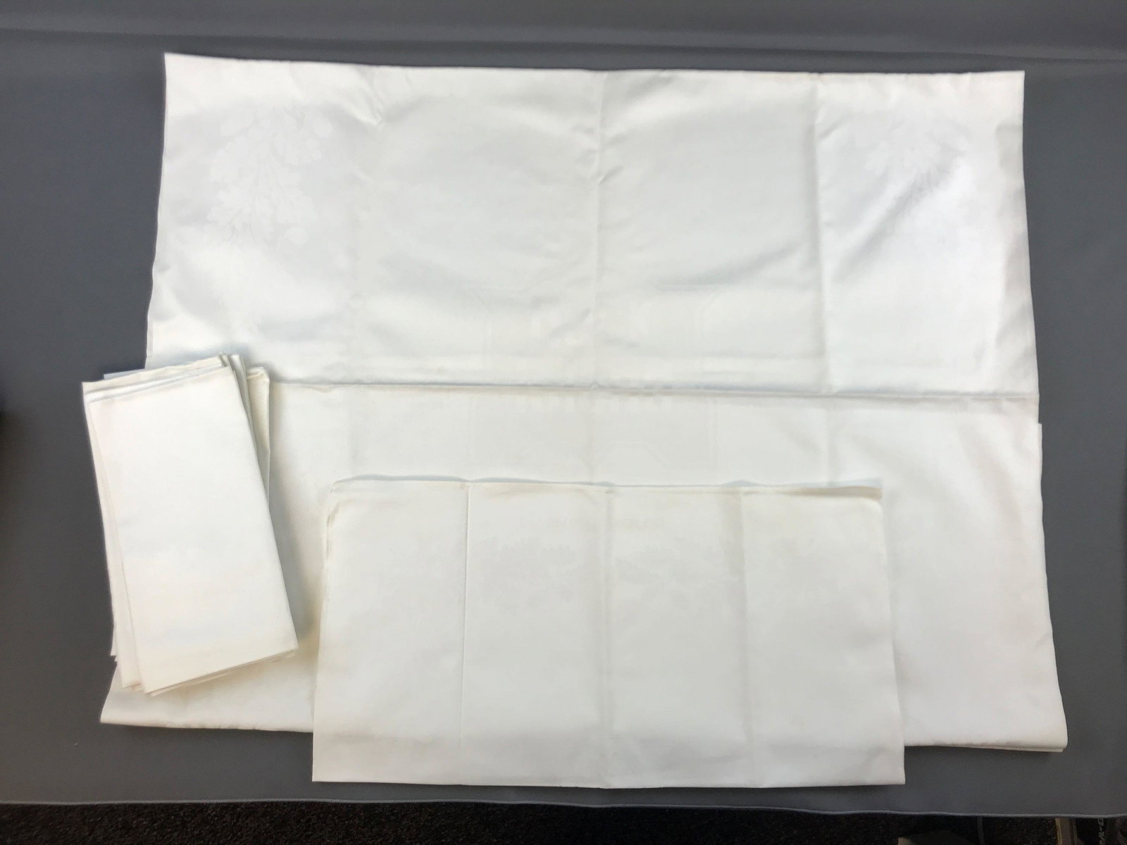 Group of Rock Island Railroad tablecloth and napkins: Never used, some marks from age. Tablecloth is 34x53 inches. Dated 1963 and 1965.