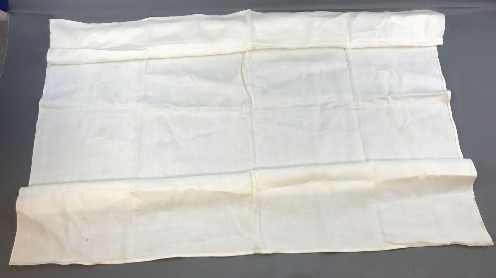 Vintage Erie Railroad tablecloth: 43x438 inches. A few small holes, a couple stains.