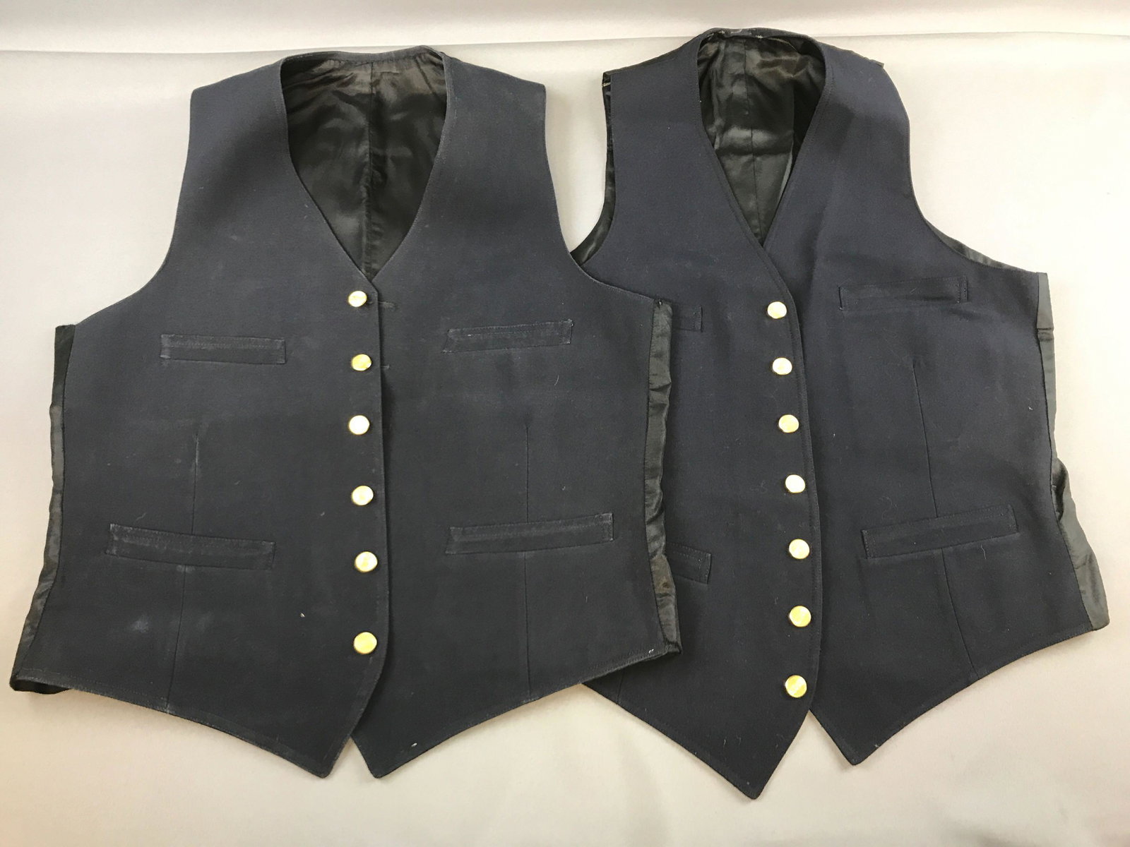 Vintage Railroad Uniform vests: CMSTP&P. All buttons connected, navy blue. Needs cleaned.