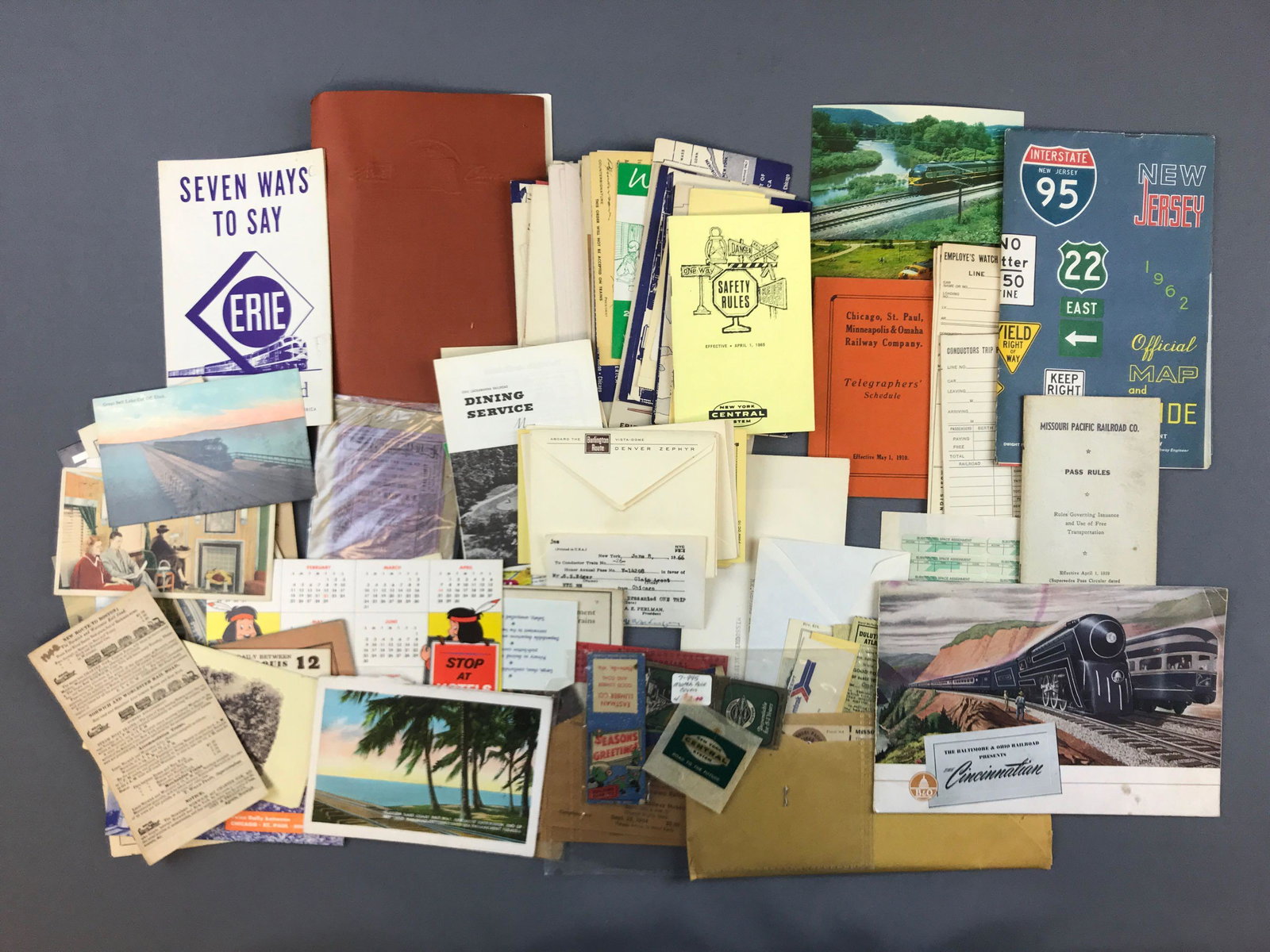 Group of vintage railroad postcards, menus, tickets and: Erie, Amtrak, Burlington Route and more