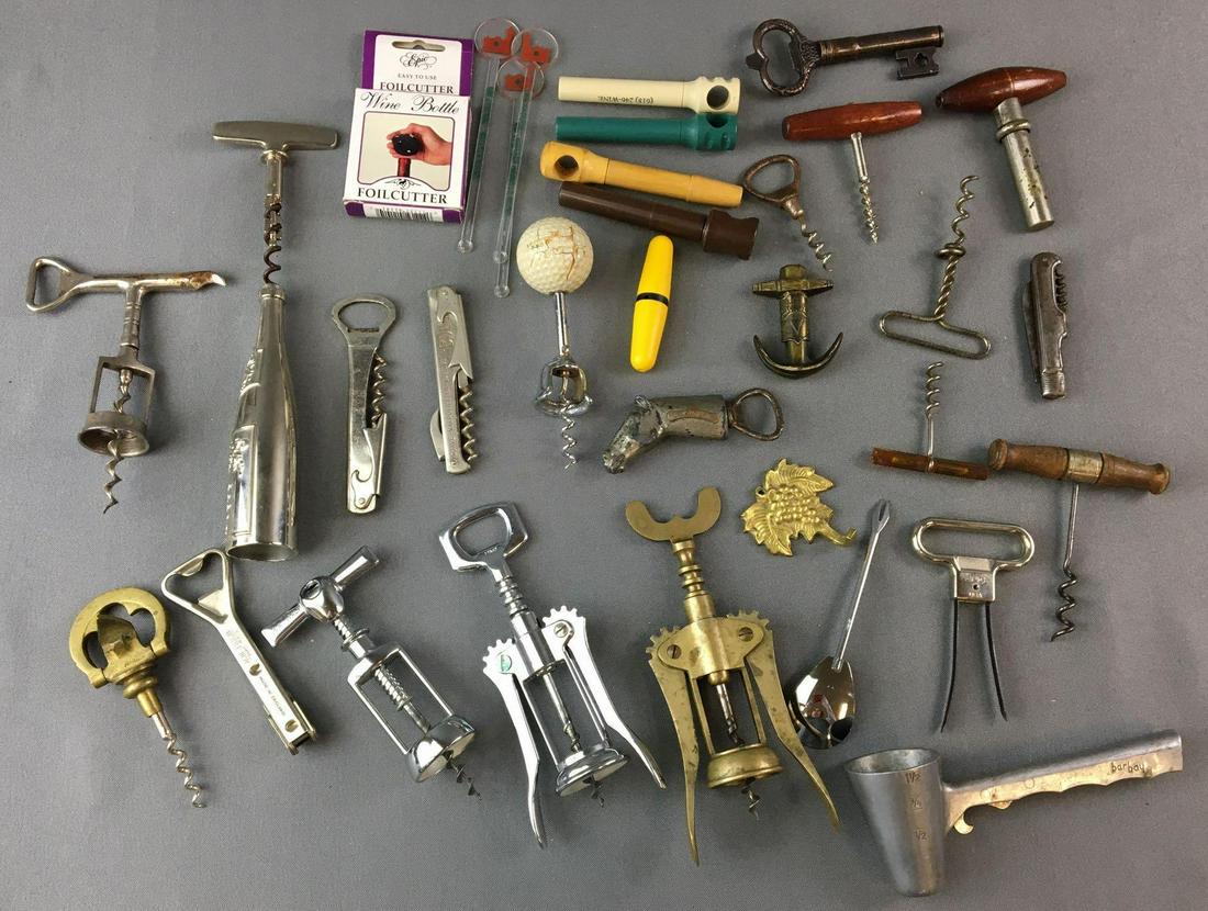 Group of Cork Screws and more: Includes bar boy multi tool, bottle openers foil cutters and more