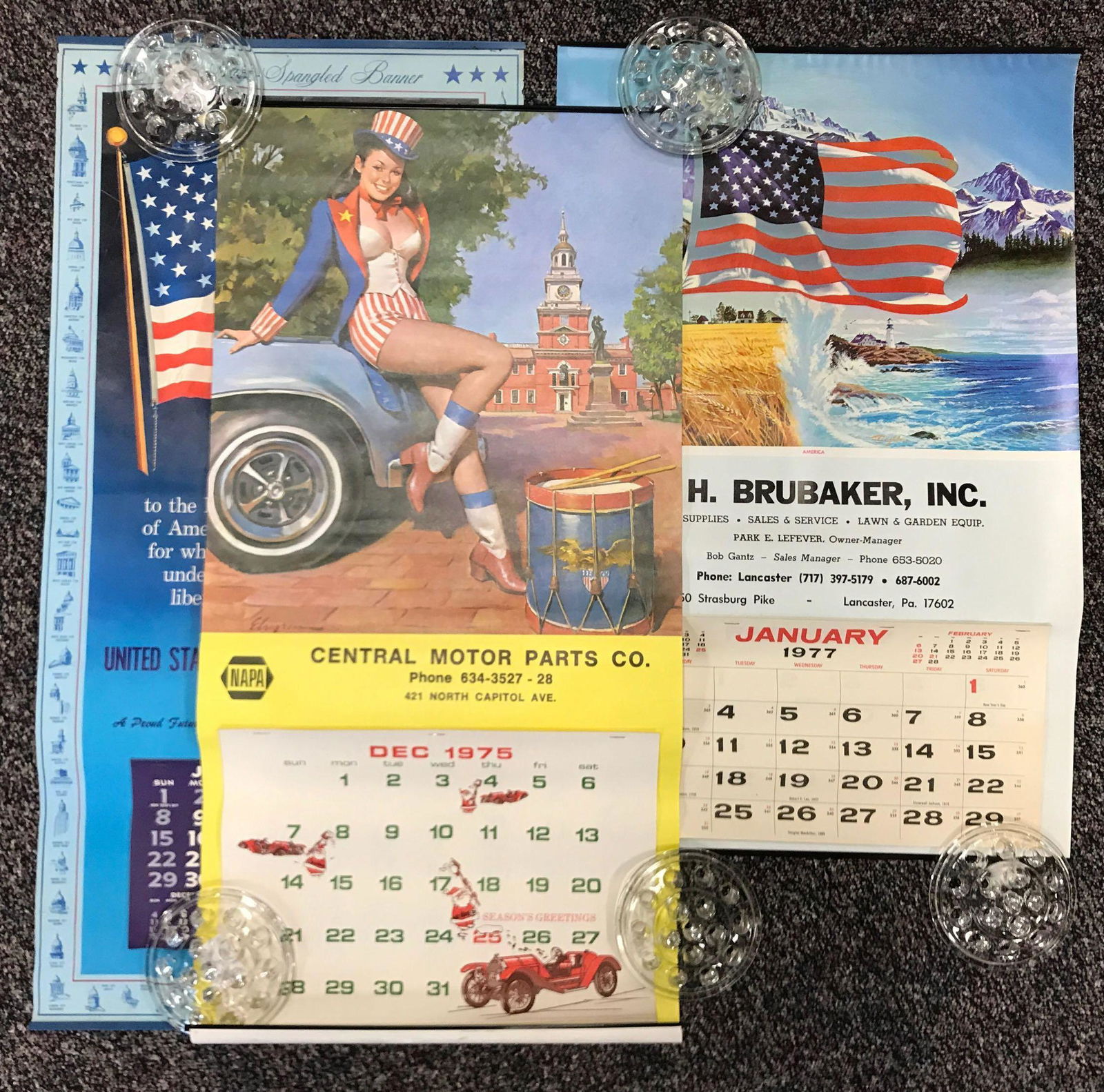 Group of 3 vintage paper wall calendars: Patriotic themed, 1967, 1975, 1977. Largest is 16x33 inches.
