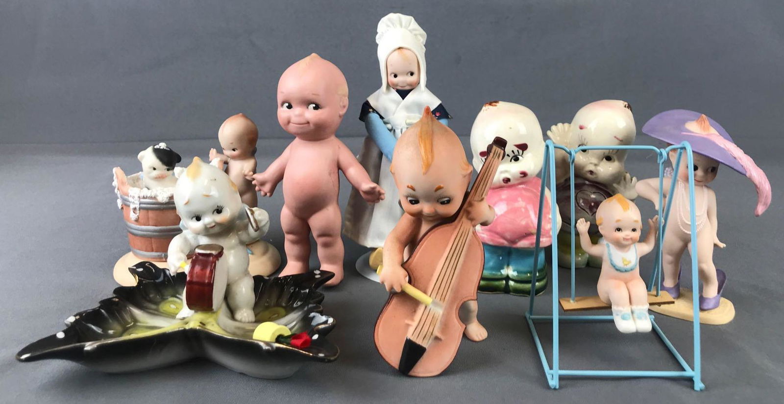 Group of 9 porcelain Kewpie figurines (1 of 5)