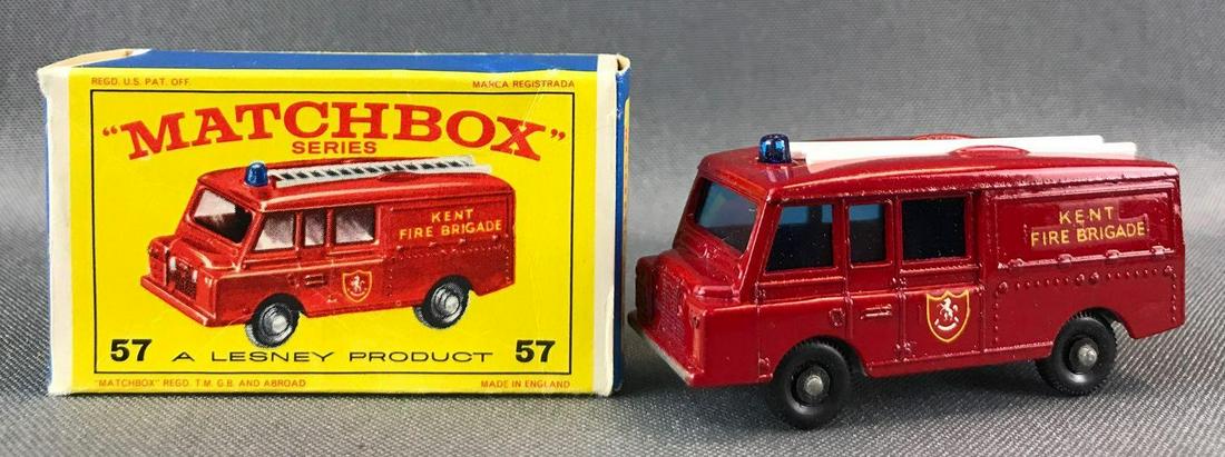 Matchbox No. 57 Land Rover Fire Truck Die-Cast Vehicle: Red body, blue windows, Kent Fire Brigade decals, BPW. A Lesney Product. Made in England