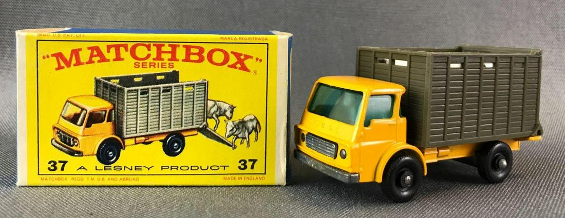 Matchbox No. 37 Cattle Truck Die-Cast Vehicle with: Yellow body, blue/green windows, BPW. With cattle. A Lesney Product. Made in England