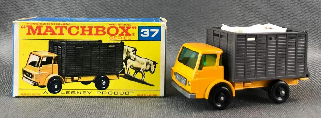 Matchbox No. 37 Cattle Truck Die Cast Vehicle with: Yellow body, blue/green windows, BPW. With cattle. A Lesney Product. Made in England