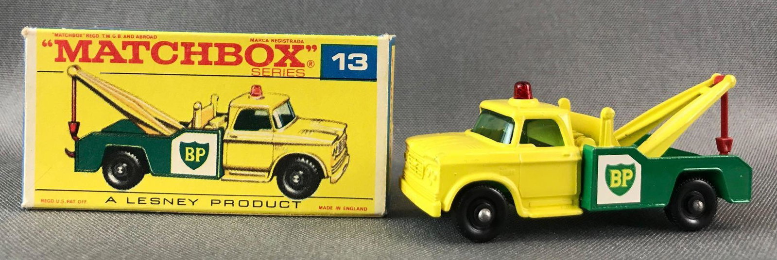 Matchbox No. 13 Dodge Wreck Truck Die-Cast Vehicle with: Dodge Wreck Truck. Yellow/green body, green base, blue/green windows, BPW, BP decals.A Lesney Product. Made in England