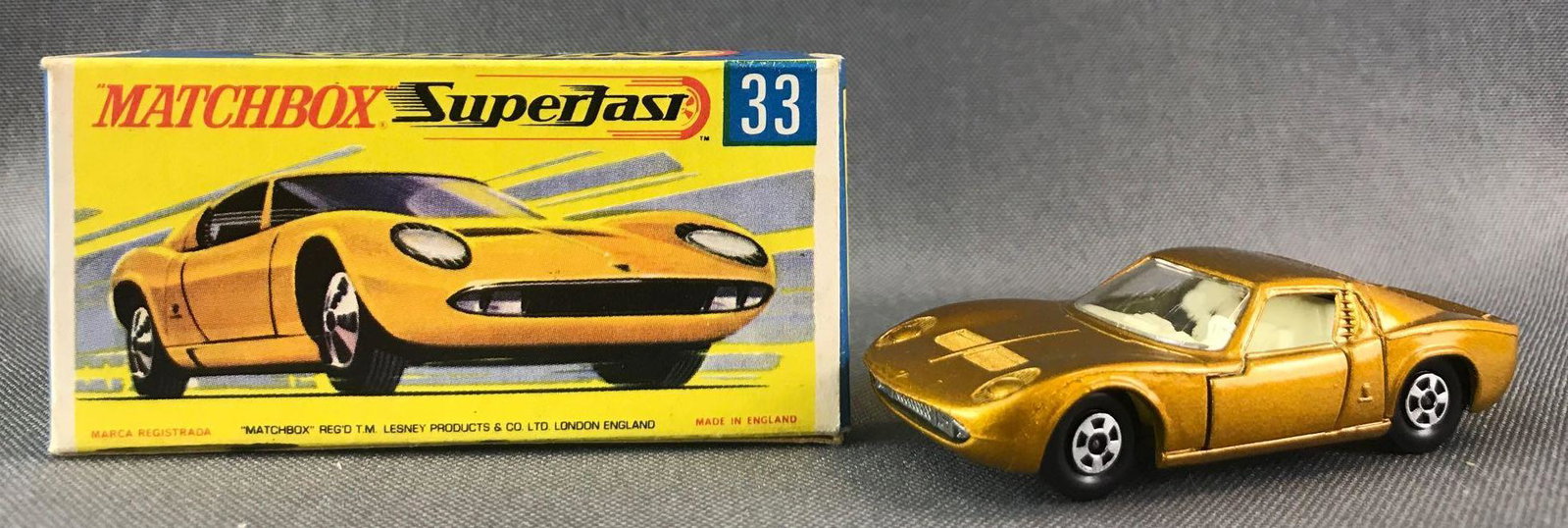 Matchbox Superfast No. 33 Lamborghini Miura P400: Gold body, BPW. Some box damage. A Lesney Product. Made in England