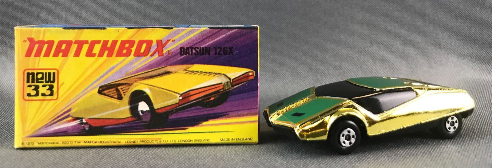 Matchbox Superfast No. 33 Datsun 126X Die-Cast Vehicle: Gold/green body, black windows, BPW. A Lesney Product. Made in England