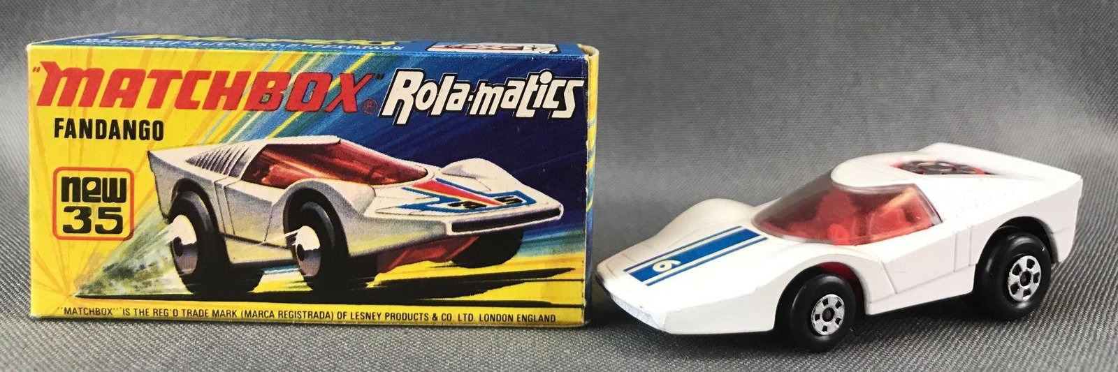 Matchbox Rola-matics No. 35 Fandango Die-Cast Vehicle: White body, red base, BPW. A Lesney Product. Made in England