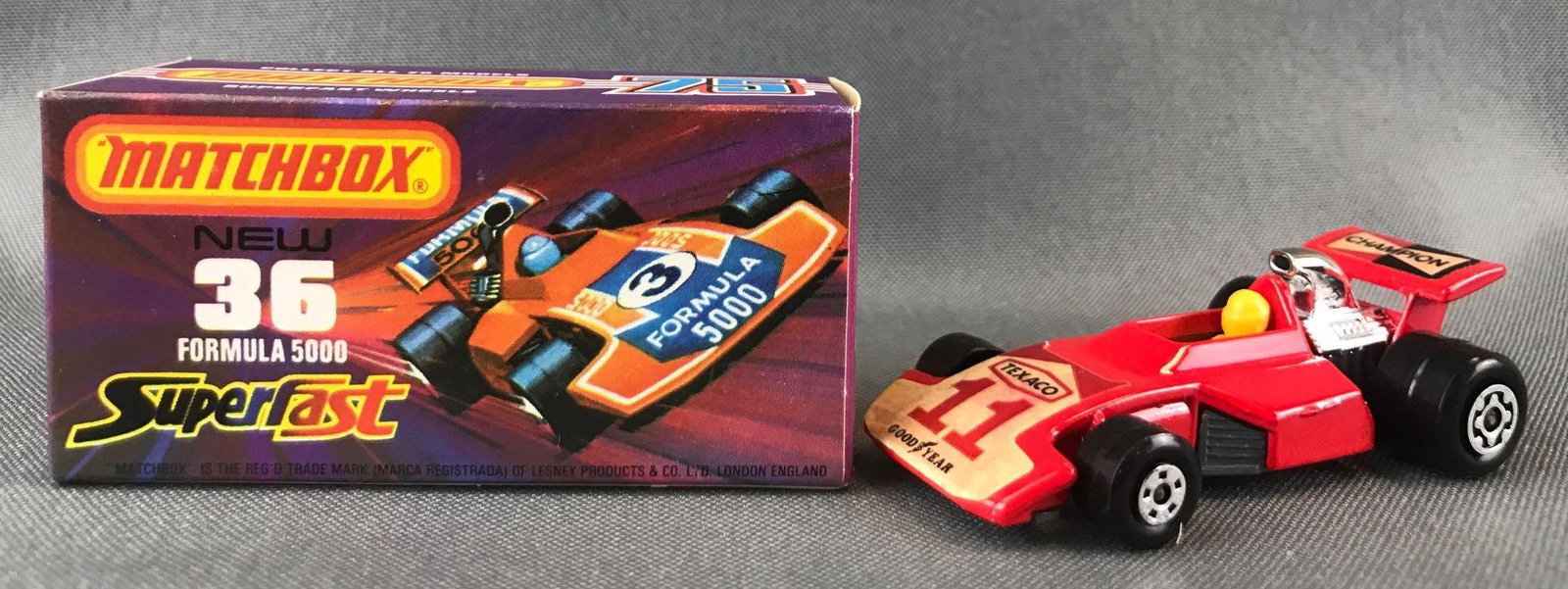 Matchbox Superfast No. 36 Formula 500 Die-Cast Vehicle: Red body, BPW. Champion, Texaco, and Goodyear decals. A Lesney Product. Made in England
