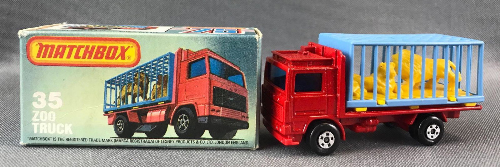 Matchbox No. 35 Zoo Truck Die-Cast Vehicle with: Red body and base, blue windows, BPW. With Lion cage. A Lesney Product. Made in England