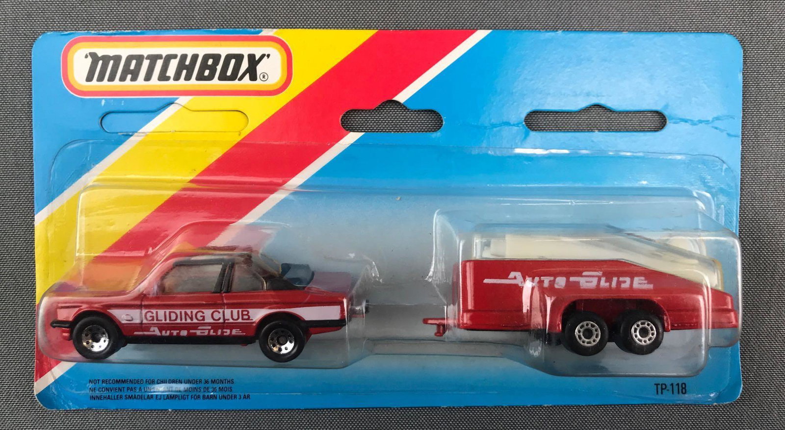 Matchbox TP-118 Die-Cast Vehicle and Trailer Set in: Includes BMW 323i Cabriolet and Glider Transporter. A Lesney Product. Made in Macau