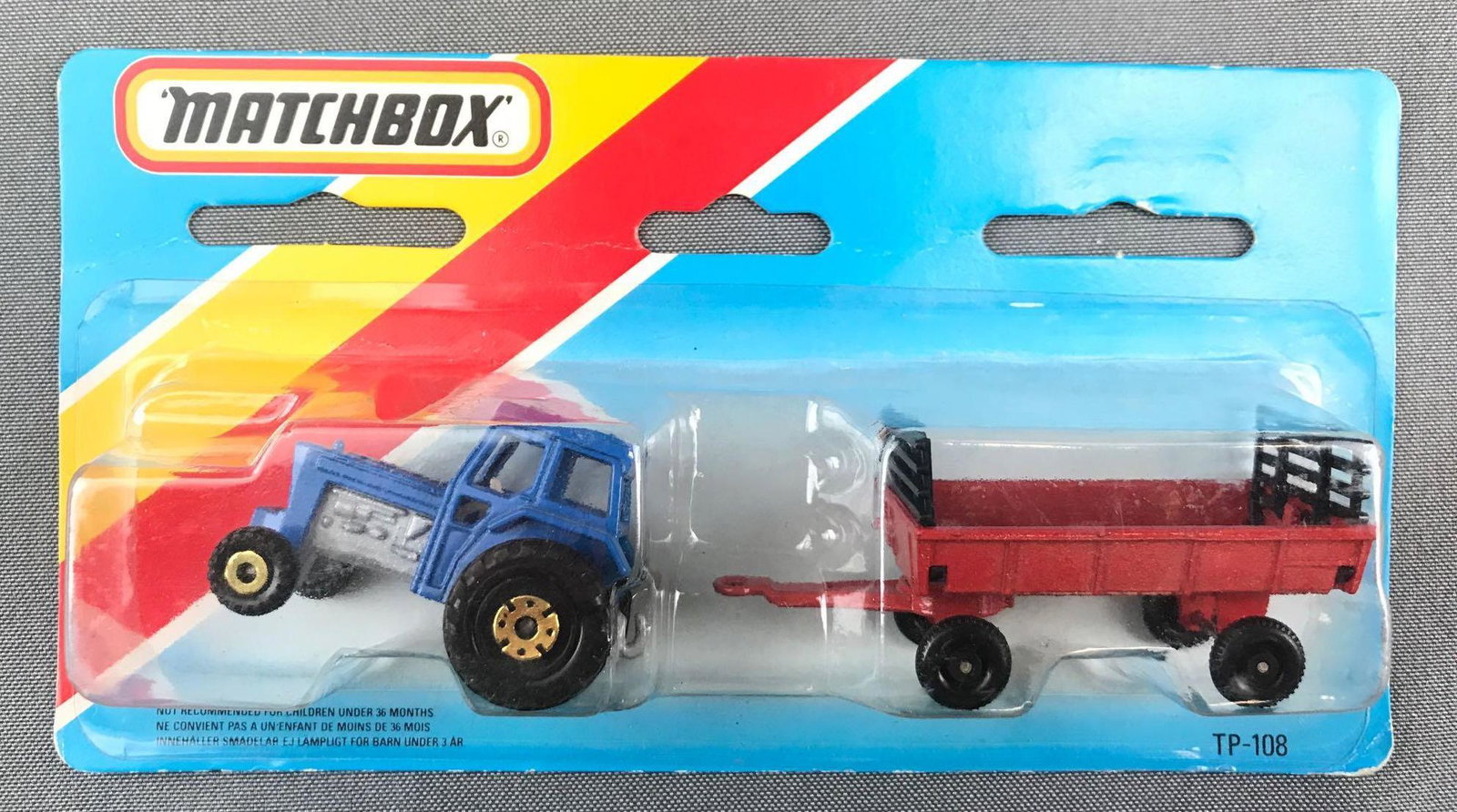 Matchbox TP-108 Die-Cast Vehicle and Trailer Set in: Includes Tractor and Hay Trailer. A Lesney Product. Made in Macau