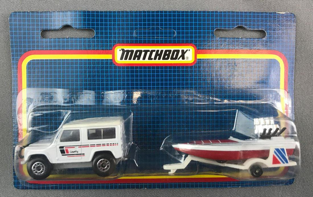 Matchbox Die-Cast Vehicle and Trailer Set in Original: Includes Land Rover Ninety, Boat and Trailer. A Lesney Product. Made in Thailand