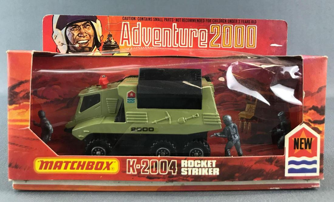 Matchbox Adventure 2000 K-2004 Rocket Striker Die-Cast: Green body, BPW. A Lesney Product. Made in England