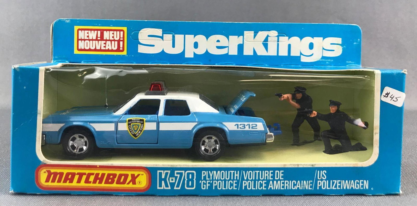Matchbox Super Kings K-78 Plymouth GF Police Die-Cast: Blue body, BPW, NYC Police decals. Some damage to packaging. A Lesney Product. Made in England