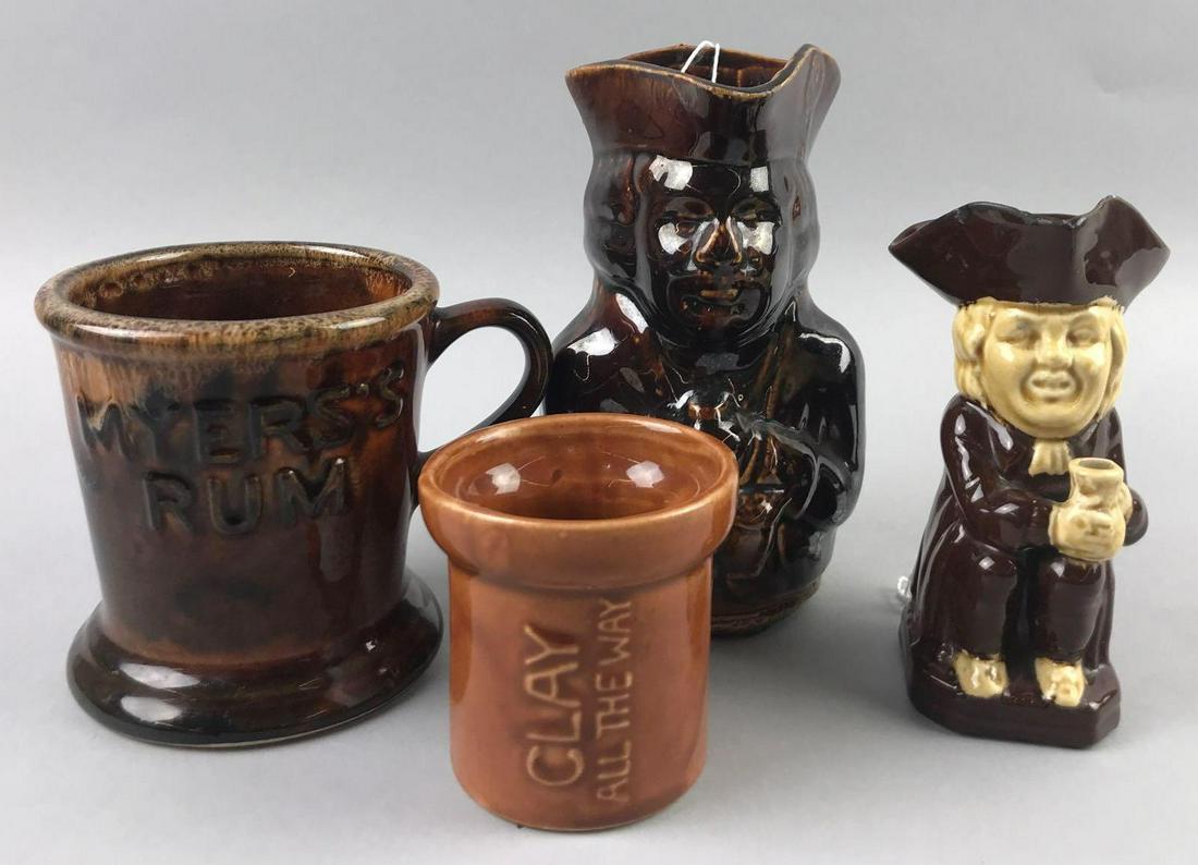 Group of 4 vintage pottery mugs and more: (2) Toby jugs- smaller has repair in hat brim. Meyers Rum advertising mug. Small clay pot, Ohio 1950. Largest is 6 inches.