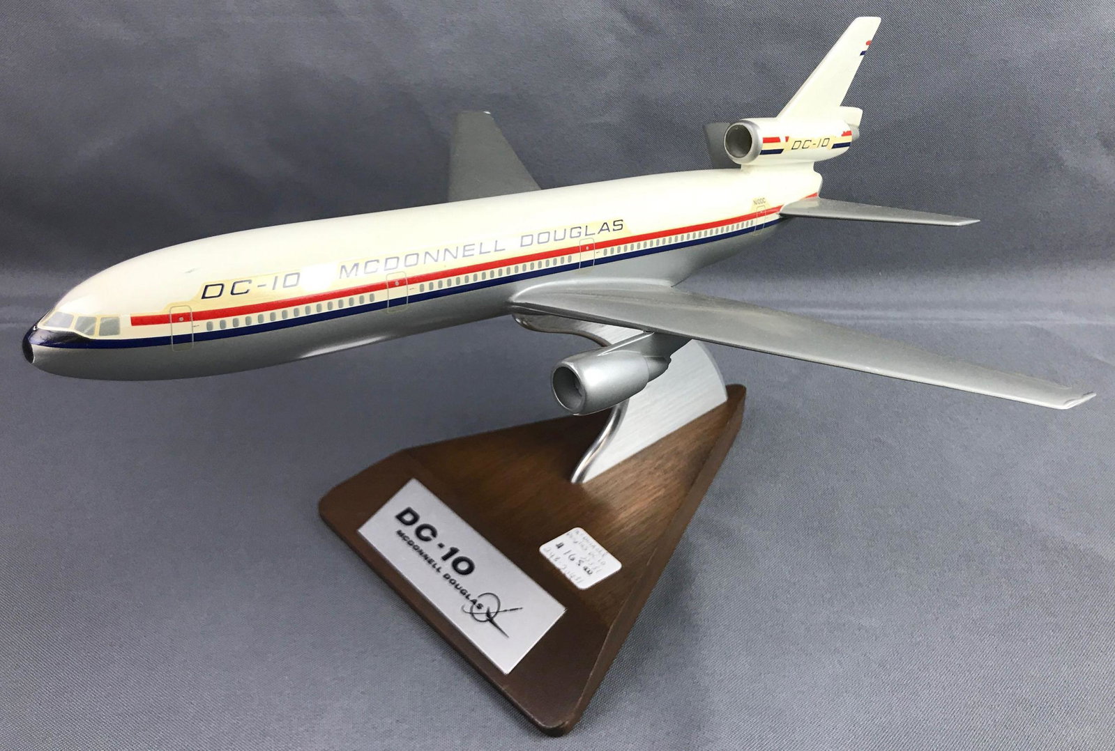 DC-10 McDonald Douglas airplane with stand: Plane is 13 inches long by 11.5 inches wide