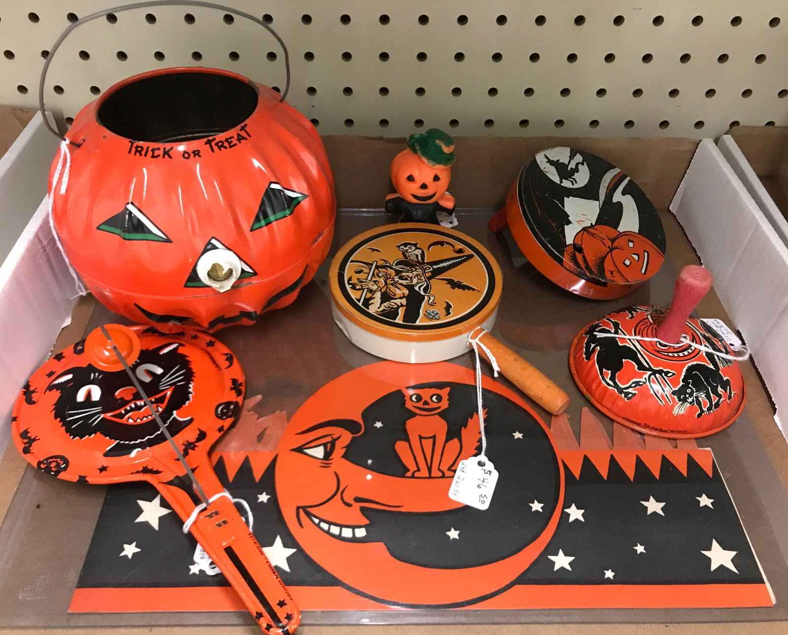Group of 7 vintage Halloween items: Tin, paper, plastic. Noise makers and decor.