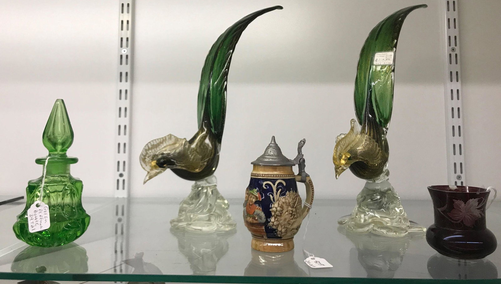 Group of 5 antique glass bird and more: perfume bottle toothpick holder mini stein glass bird sculptures, some damage to one bird. Largest bird is 10 inches tall