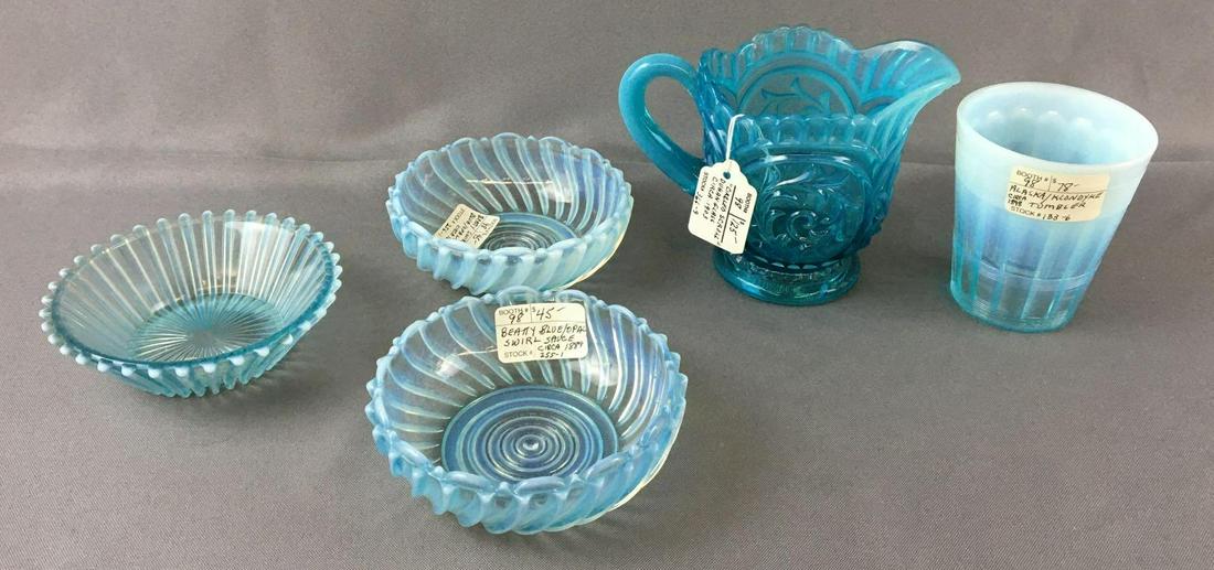 Group of 5 Antique Blue Glassware: Includes blue opalescent swirl bowls, Betty rib, and more largest is 4 1/4 inches tall