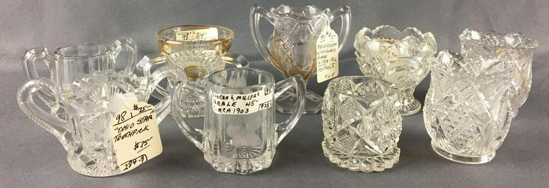 Group of 9 Antique Toothpick Holders: Circa early 1900s, includes rising sun, Ohio star, reverse 44 with US Glass mark and more, largest is 3 1/4 inches tall
