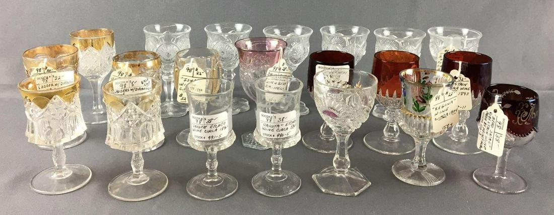 Group of 21 Antique Small Wine Glasses: Circa early 1900s, includes Regina, rising sun, bead swag, Dakota and more, 4 1/2 inches tall