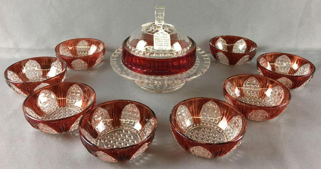 Group of 9 Antique Ruby Stain Glassware: Circa late 1800s, includes 8 Sauces and a bar and flute covered dish , 7 1/2 x 6 inches