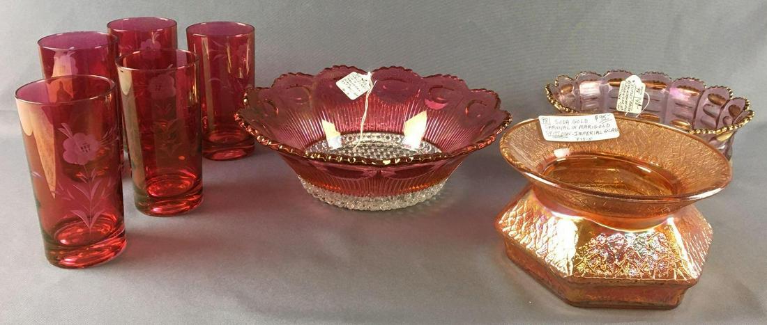 Group of 8 Antique Glassware: Includes 5 etched cranberry 6 inch tumblers, soda gold marigold carnival spittoon Manhattan cranberry stain 10 1/2 inch bowl and elipses Berry bowl