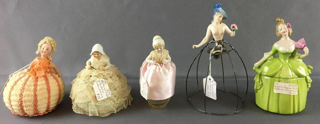 Group of 5 Antique Porcelain Dolls: Most made in Germany, Includes erphila dresser box Madame pompadour, perfume bottle cover doll, 2 pin cushion dolls, largest is 7 1/2 inches tall