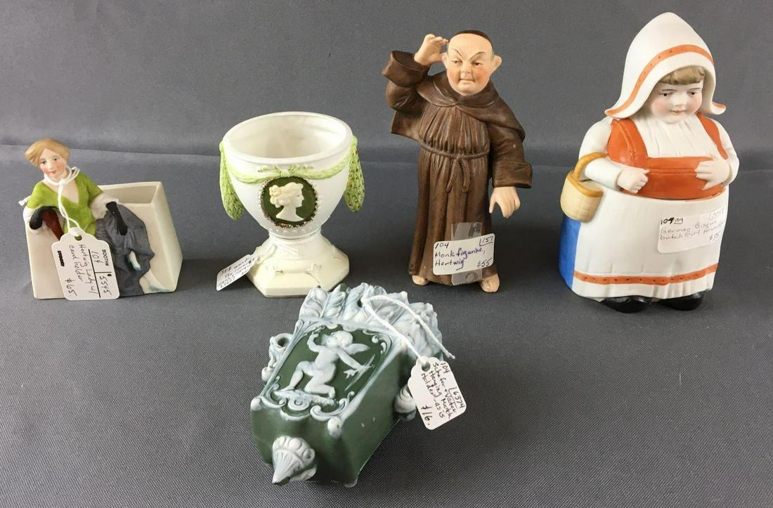 Group of 5 Antique Schafer and Vater Egg Holder and: Includes Schafer hanging match stick holder, German bisque Dutch girl humidor, monk figurine and hartwig lady card holder, largest w5 1/2 inches tall