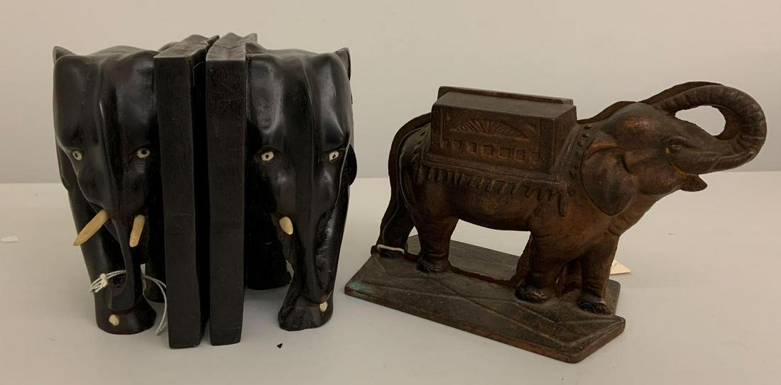 Group of two vintage pairs of elephant bookends: Good hand carved Nigerian elephants missing one trunk, and iron with copper wash pair, Largest 9 x 5 inches