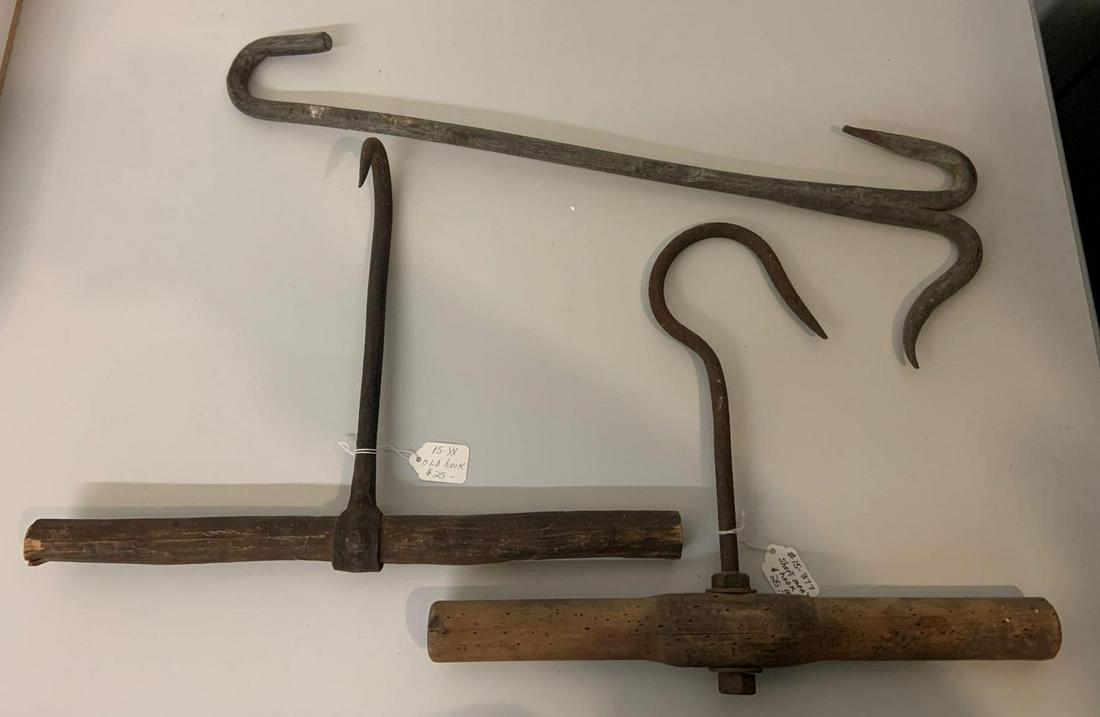 Group of three antique meat hooks: 18 x 12 1/2 inches