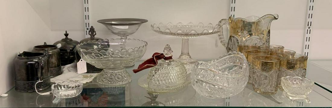 Shelf lot of miscellaneous glass and silver plate items: Includes early American press glass, and more. Sorry no shipping on this lot.