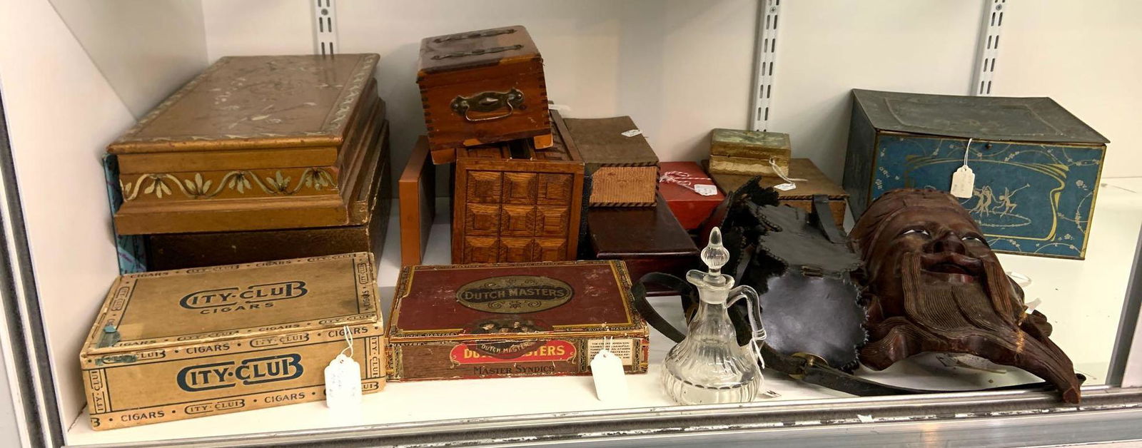 Shelf lot of miscellaneous antique and vintage items: Includes cigar boxes, teak carved mask, cruet, and more, mask measures 7 x 15 inches
