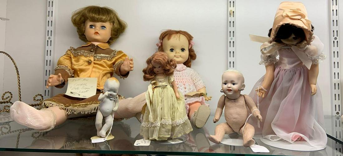 Group of six antique and vintage dolls: Largest 18 inches tall, damage throughout