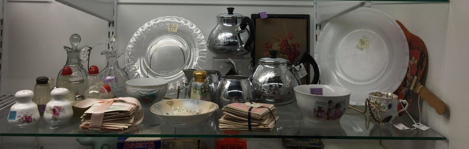 Shelf lot of antique/vintage miscellaneous items: Sorry no shipping on this lot. Includes 4 pc. Swan brand tea set, Childs porcelain bowl, small cards, salt and pepper shakers and more