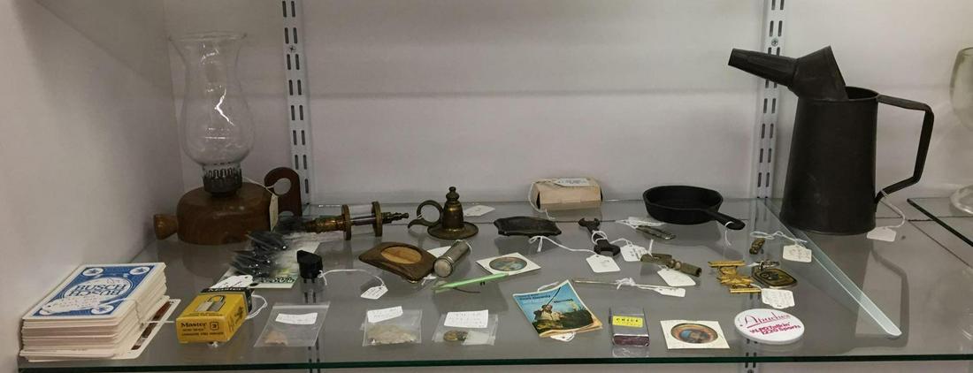 Shelf lot of Antique/Vintage Miscellaneous Items: Includes arrowheads, fishing jugs, belt buckles, hit and miss engine, metals and more