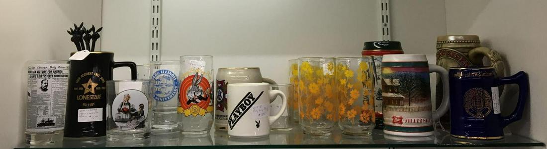 Shelf lot of Vintage Glasses and Steins: Sorry no shipping on this lot. Includes playboy mug, Budweiser mug, yellow to orange floral glass tumblers and more