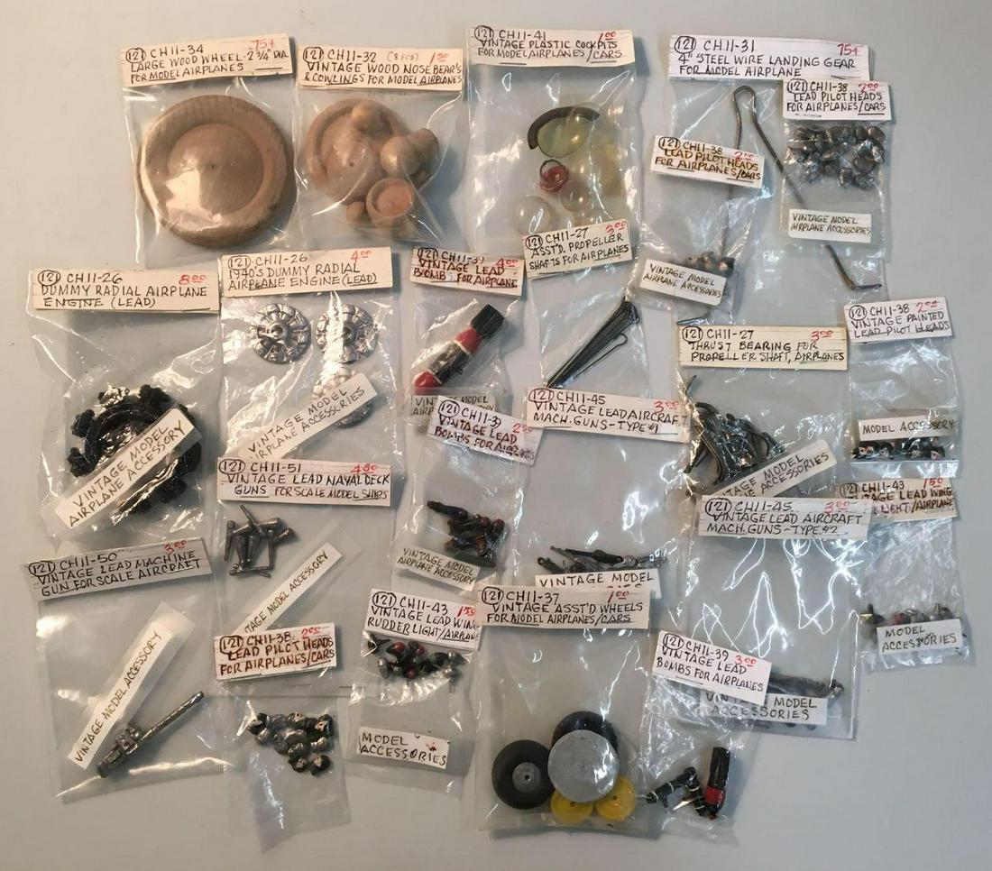 Group of Vintage Model Airplane Parts: Includes Thrust bearings, lead machine gun, lead bombs, wheels and more