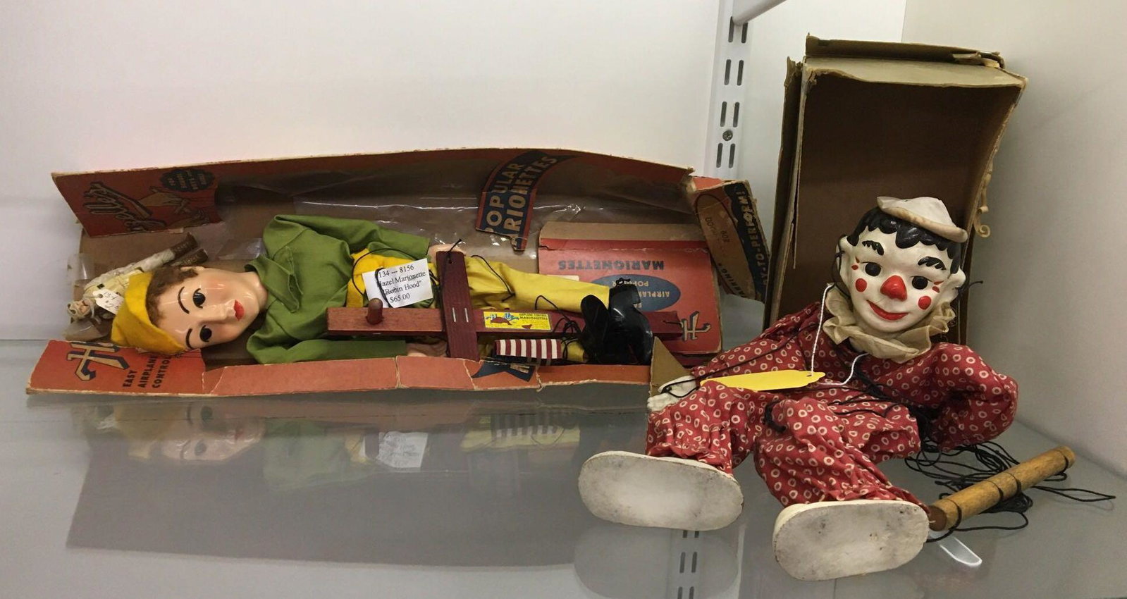 Group of 2 Vintage Marionettes: Includes Hazel Marionette Robin Hood in original box, box is damaged; and a clown marionette