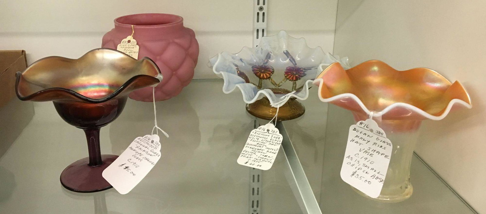 Group of 4 Antique Glassware: Includes blossom and web Egyptian art bowl, pink quilted bowl, rainbow carnival glass compote and many ribs hat shaped vase with small chip on base