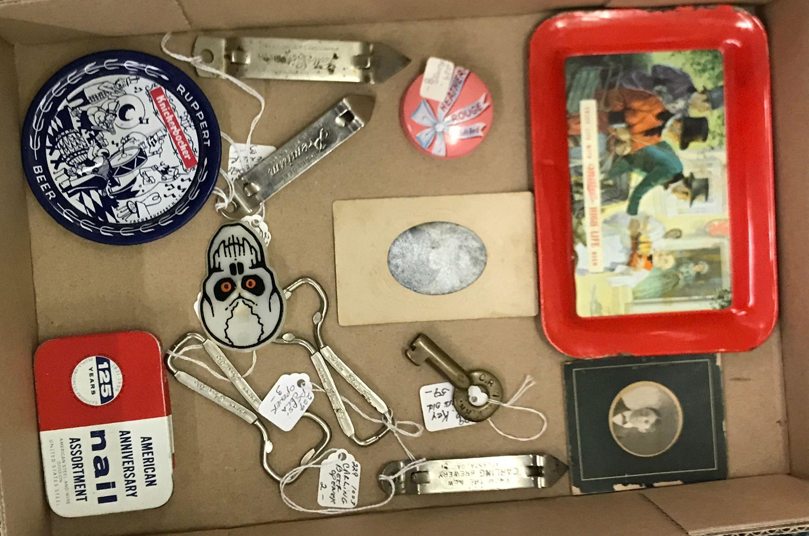 Group of 13 Vintage antiques and collectibles: Railroad key, bottle opener, beer tins, photos
