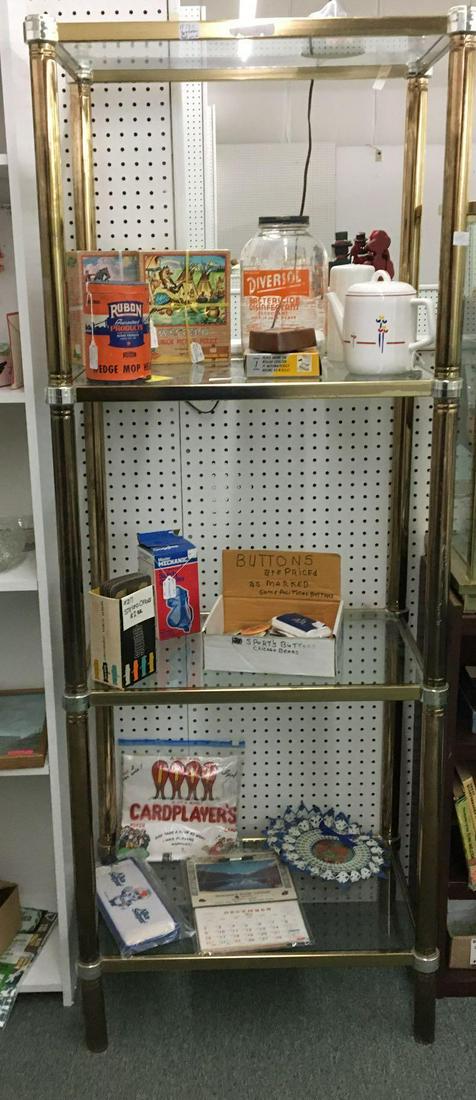 Metal And Glass 4 Tier Shelf: 25 1/2 x 68 x 17 inches. Shelving unit only, contents not included. No shipping available, pick up only.
